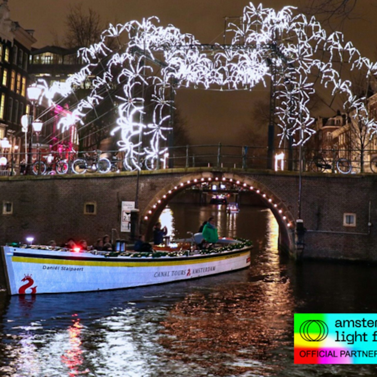 Experience Amsterdam's luminous waterways as you glide past dazzling installations and twinkling lights all while staying warm under cozy blankets in an open-top boat.