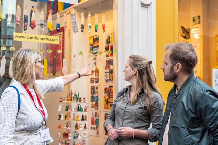 Explore the intriguing sights of Amsterdam's red light district as knowledgeable guides share insights on its unique history colorful shops and the evolving landscape of sex work.