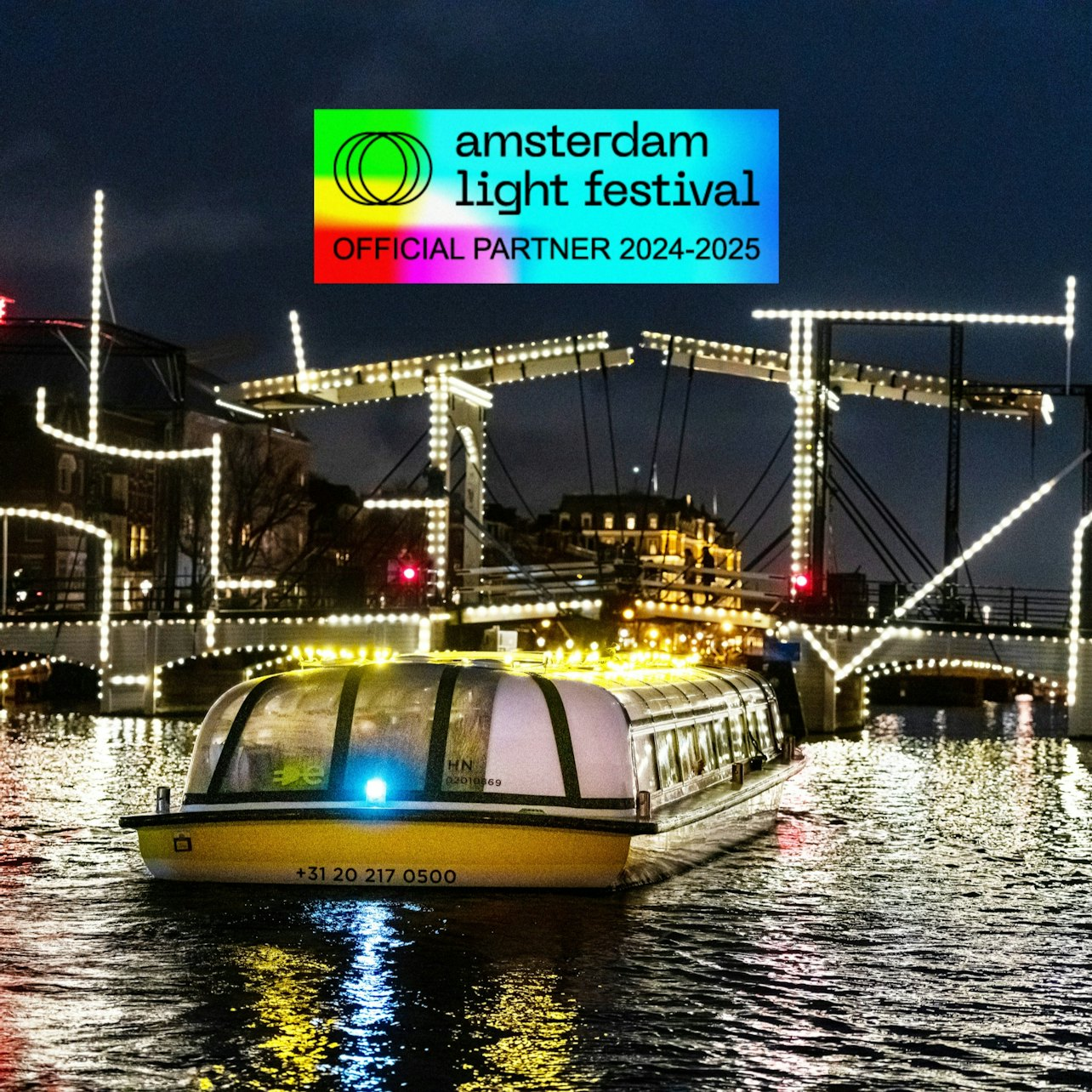 Amsterdam Light Festival: Covered Boat Cruise + Hot Choco - Photo 1 of 6
