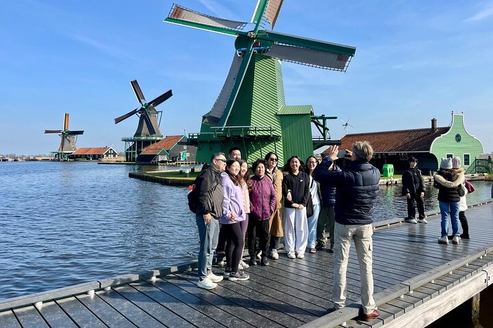 Enjoy the view of the windmills in Zaanse Schans.