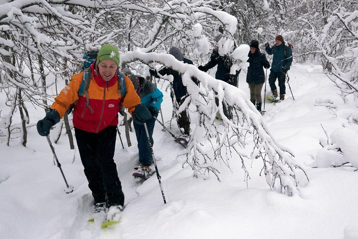 Experience the joy of exploring Tromsø’s snowy landscapes on a guided snowshoe trek. Trek through untouched snow enjoy scenic views and savor warm drinks amidst nature’s beauty.