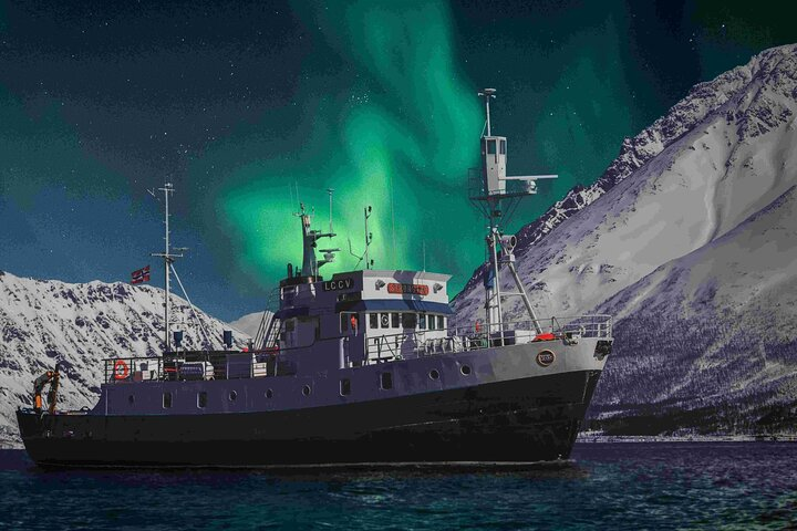 Experience the wonder of the Northern Lights aboard the historic MS Strønstad surrounded by stunning Arctic landscapes and the serene sound of the waves making for a truly unique adventure.