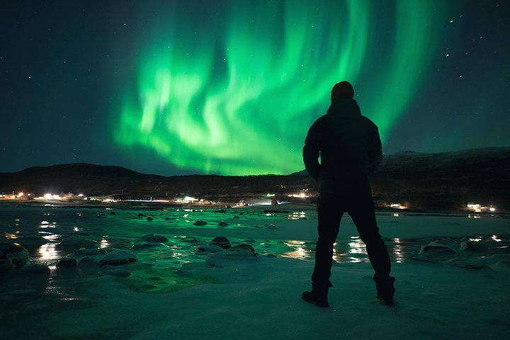 Experience the magic of the Northern Lights as you chase the aurora across diverse landscapes all while enjoying the comfort of a heated bus and expert guidance.