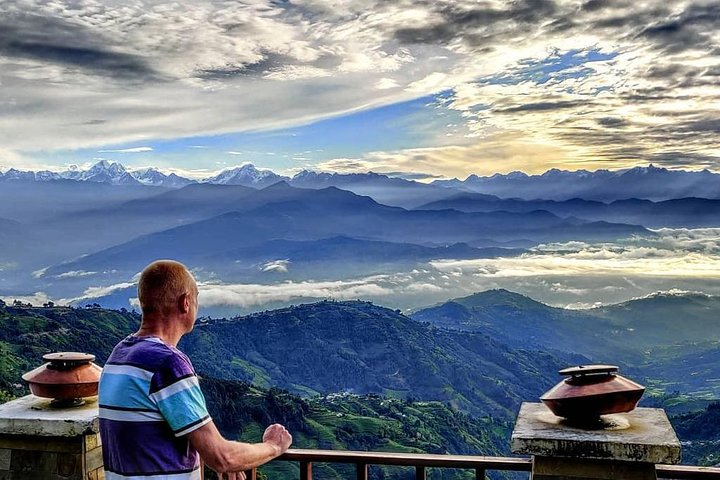 Tourist enjoying beautiful panoramic view of the mountains from Nagarkot