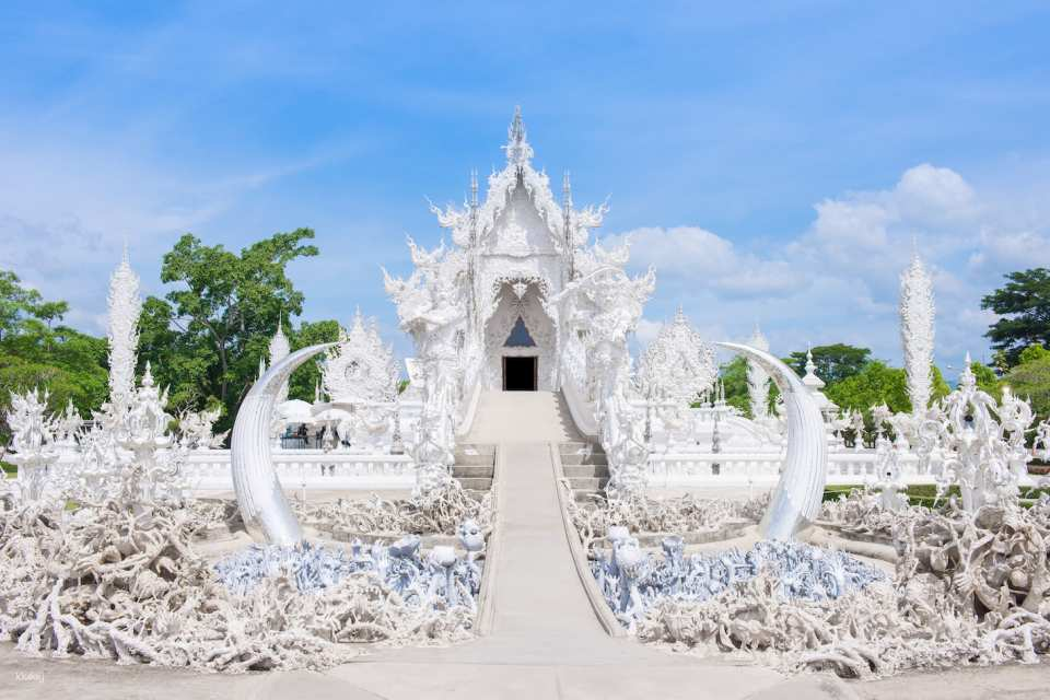 Chiang Rai Day Tour from Chiang Mai | White Temple, Blue Temple, Black Museum, Golden Triangle & Singha Park - Photo 1 of 10