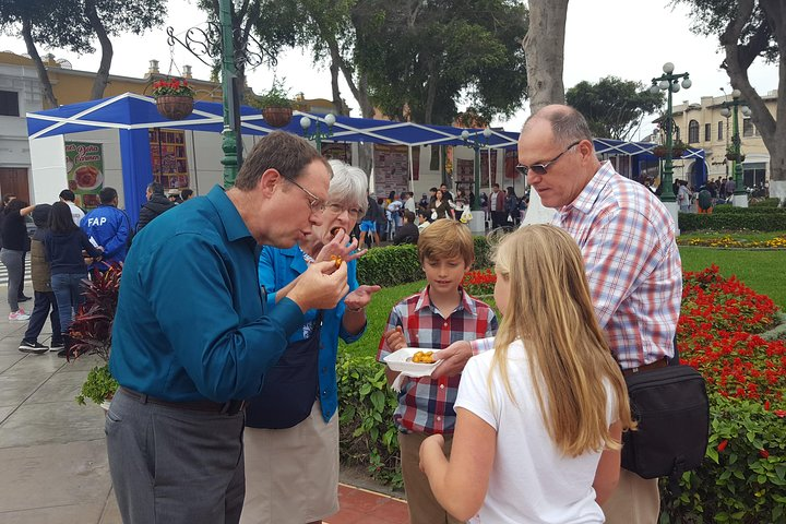 Try fun street foods as we encounter them, here we have picarones, the Peruvian Doughnut!