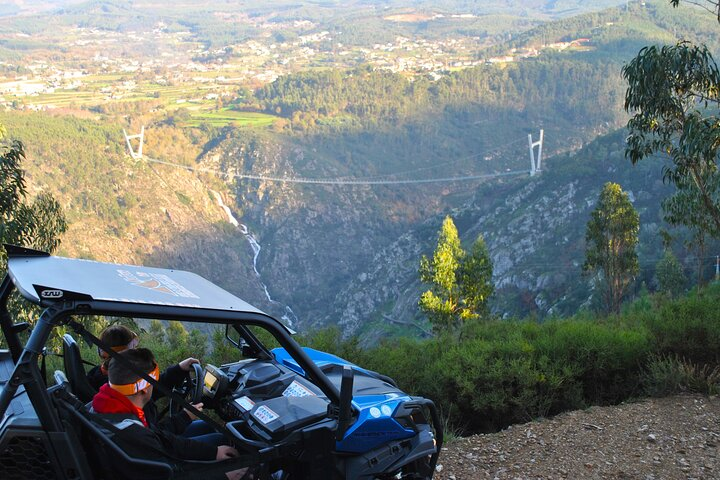 Experience the rugged beauty of Arouca Geopark from the comfort of a CAN-AM buggy navigating through stunning landscapes while uncovering local history and breathtaking views. Adventure awaits!