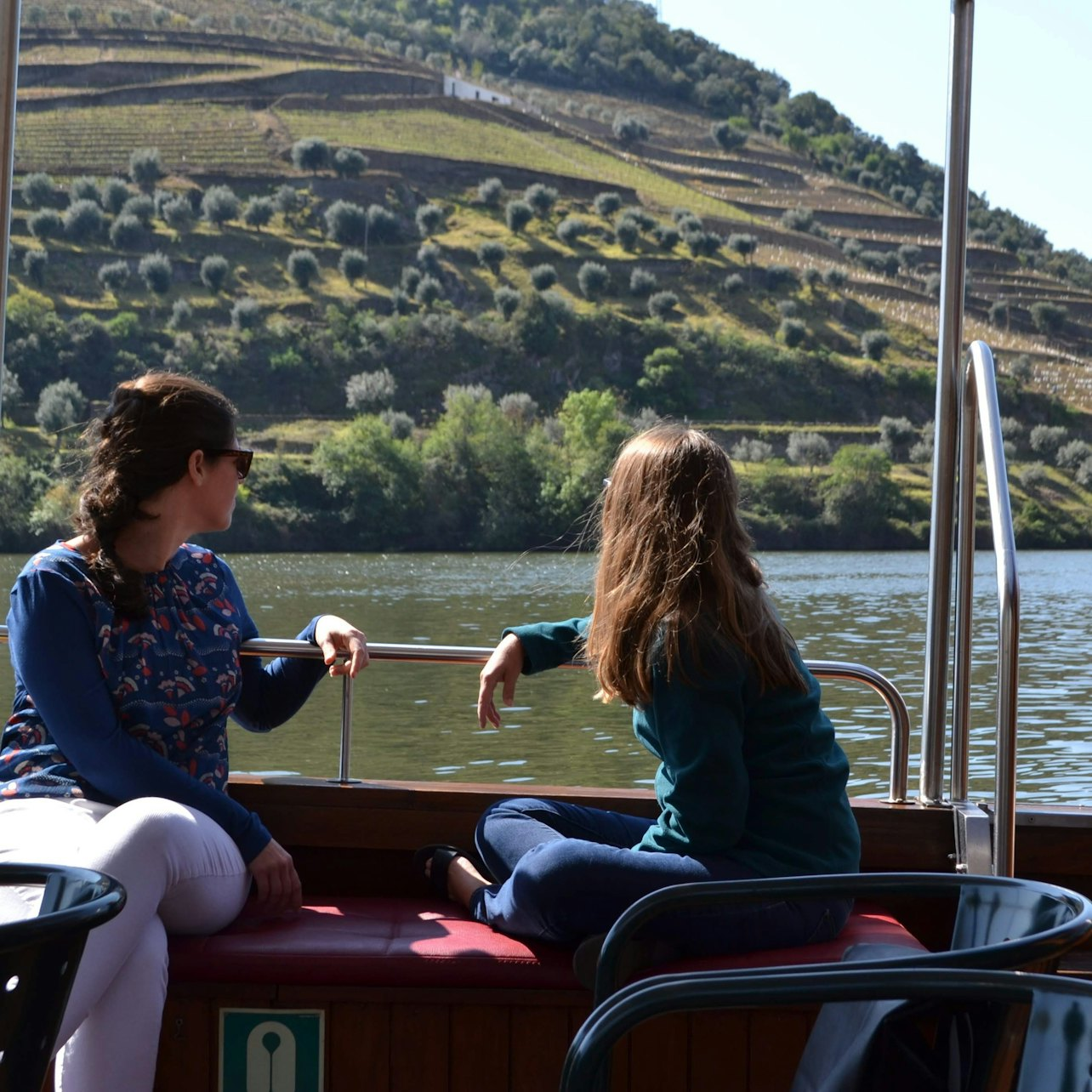 Experience the serenity of the Douro Valley as you glide along the river surrounded by stunning landscapes and charming vineyards perfect for creating lasting memories.