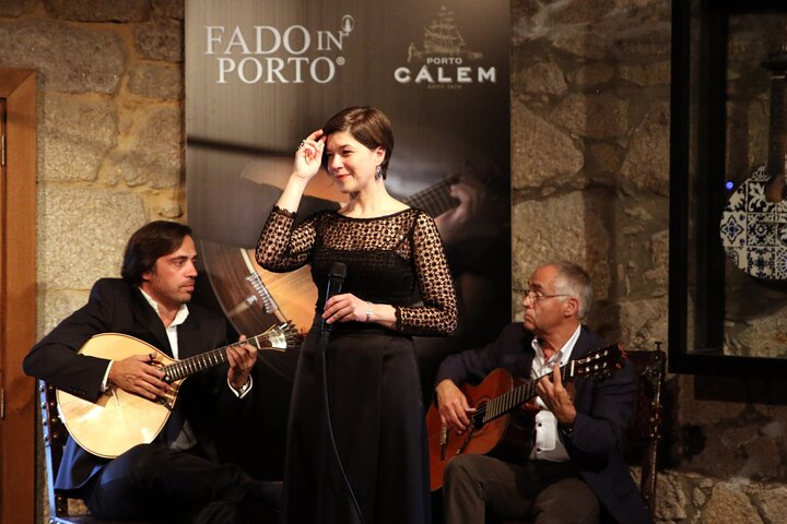 Immerse yourself in the soulful strains of Fado accompanied by exquisite port wine all within the historic setting of Cálem Wine Cellars. A true taste of Porto's culture awaits.