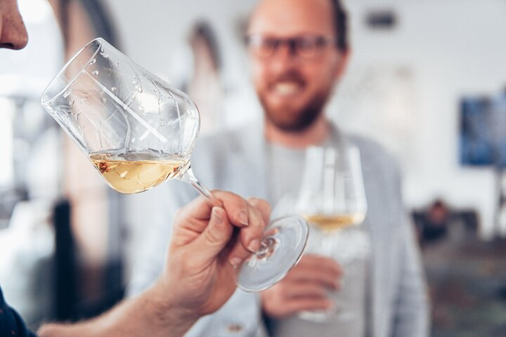 Experience the art of wine tasting in Lisbon with expert guidance. Discover rich flavors and aromas of non-alcoholic wines while connecting with local traditions in a unique setting. Cheers to exploration!