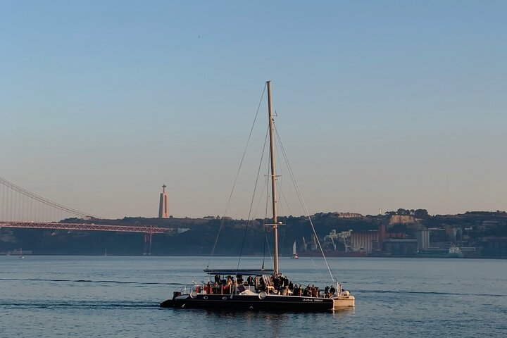 Lisbon : Sunset Catamaran Boat Tour with Music and Drinks - Photo 1 of 17