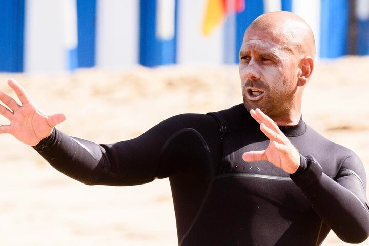 The surf instruction coach in action