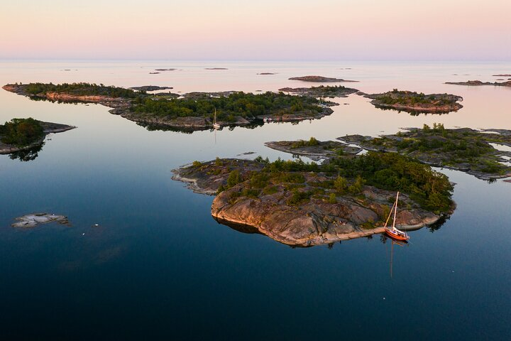 Paddle through serene waters discover secluded islands and immerse in the tranquility of nature while wild camping in Stockholm's breathtaking archipelago. Adventure awaits at every turn!