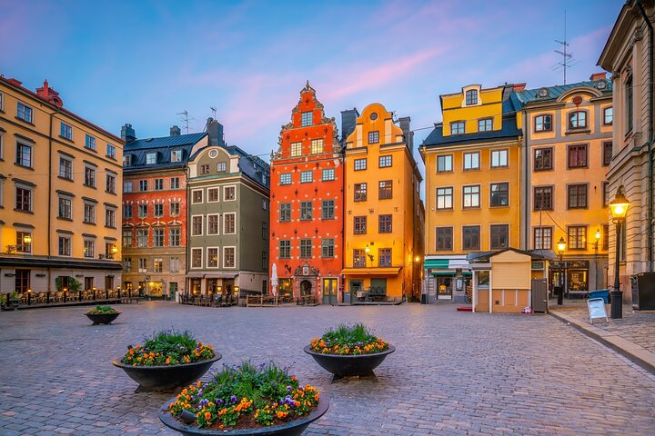 Discover the charm of Stockholm's Old Town with colorful buildings and cobbled streets perfect for a leisurely bike ride. Experience history and culture in a unique way!