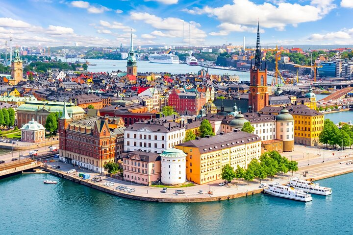 Experience Stockholm's iconic landmarks from the comfort of your vehicle with scenic routes showcasing the charm of Old Town and the beauty of historic architecture.