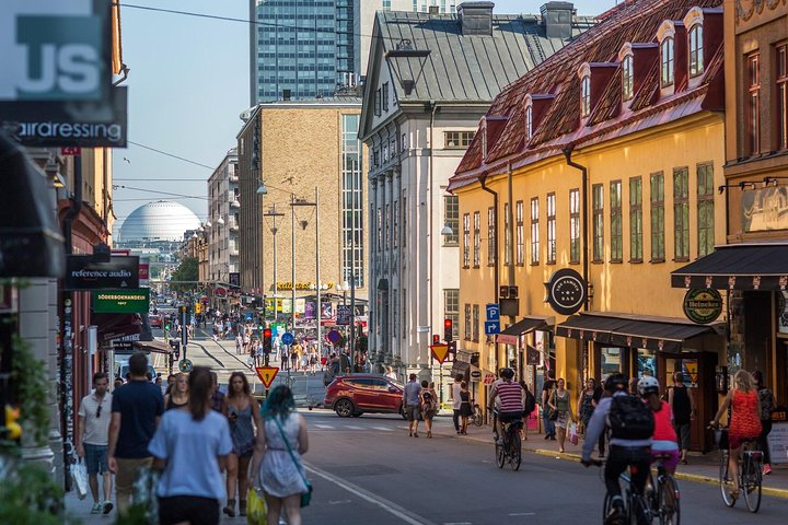 Explore Södermalm’s unique blend of historical charm and modern flair cycling through lively streets adorned with cafes artisan shops and stunning architecture perfect for any traveler’s adventure.