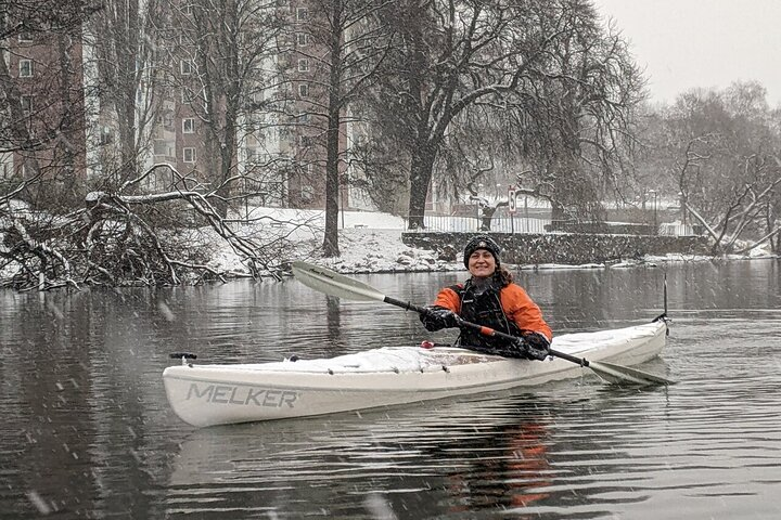 Experience the serene beauty of Stockholm's winter waterways paddling through snow-dusted landscapes while your guide shares the city's rich history and culture. An unforgettable winter adventure awaits!