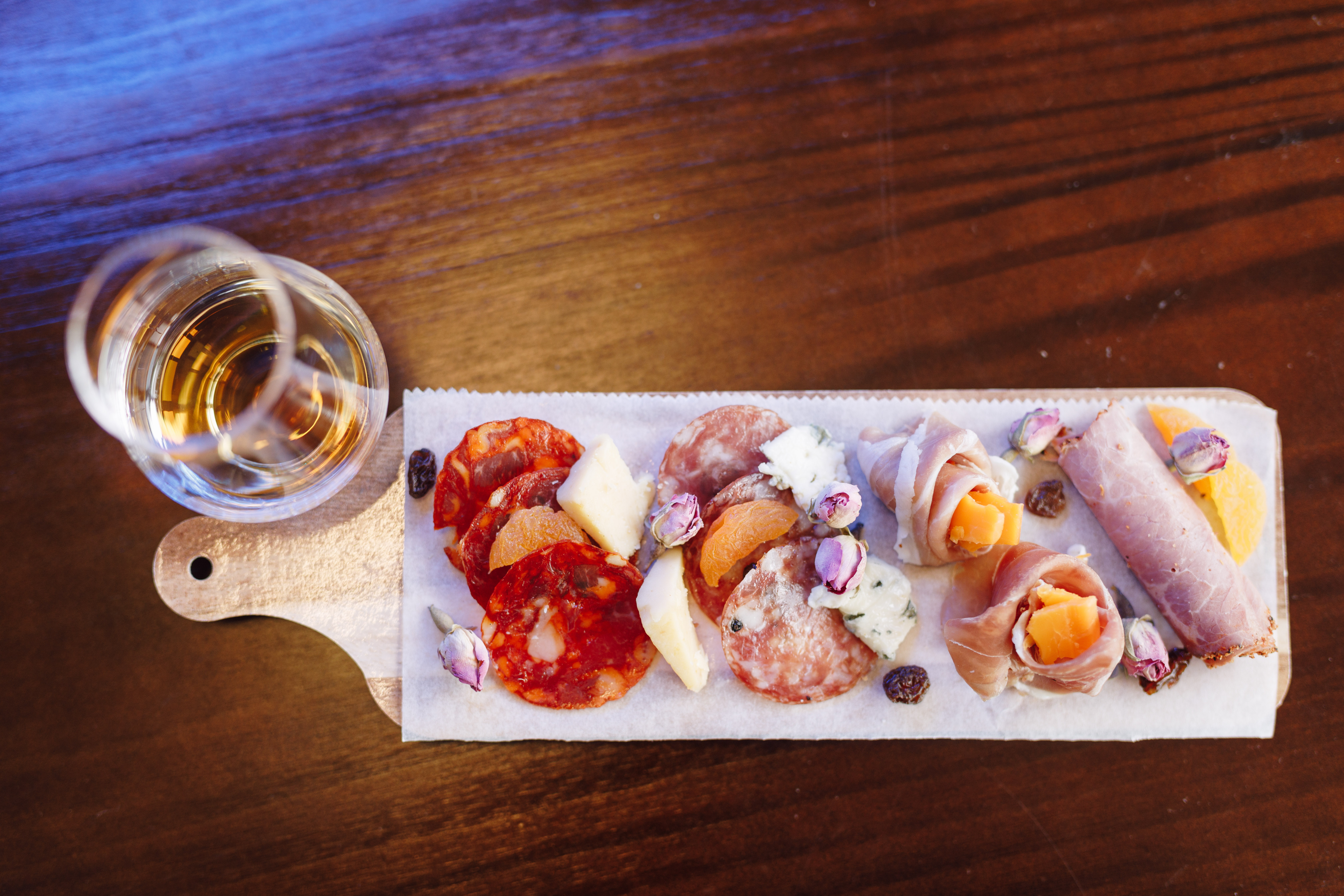 Savor the rich flavors of artisanal rums paired with a delightful selection of charcuterie bringing together exquisite tastes in the heart of Singapore's Balestier. Experience the craft of rum.