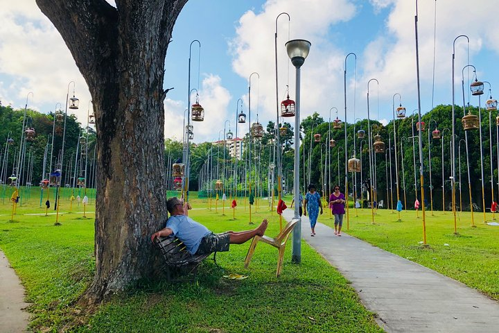 Experience the charm of Ang Mo Kio with local bird singing and casual coffee at a nearby ‘Kopitiam’. Engage with the community and savor everyday life in Singapore.
