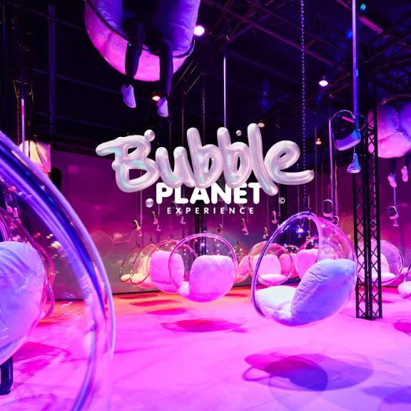 Step into a whimsical realm at Bubble Planet where oversized bubbles and floating seats create an imaginative playground. Engage your senses and let your creativity soar in this unique experience.
