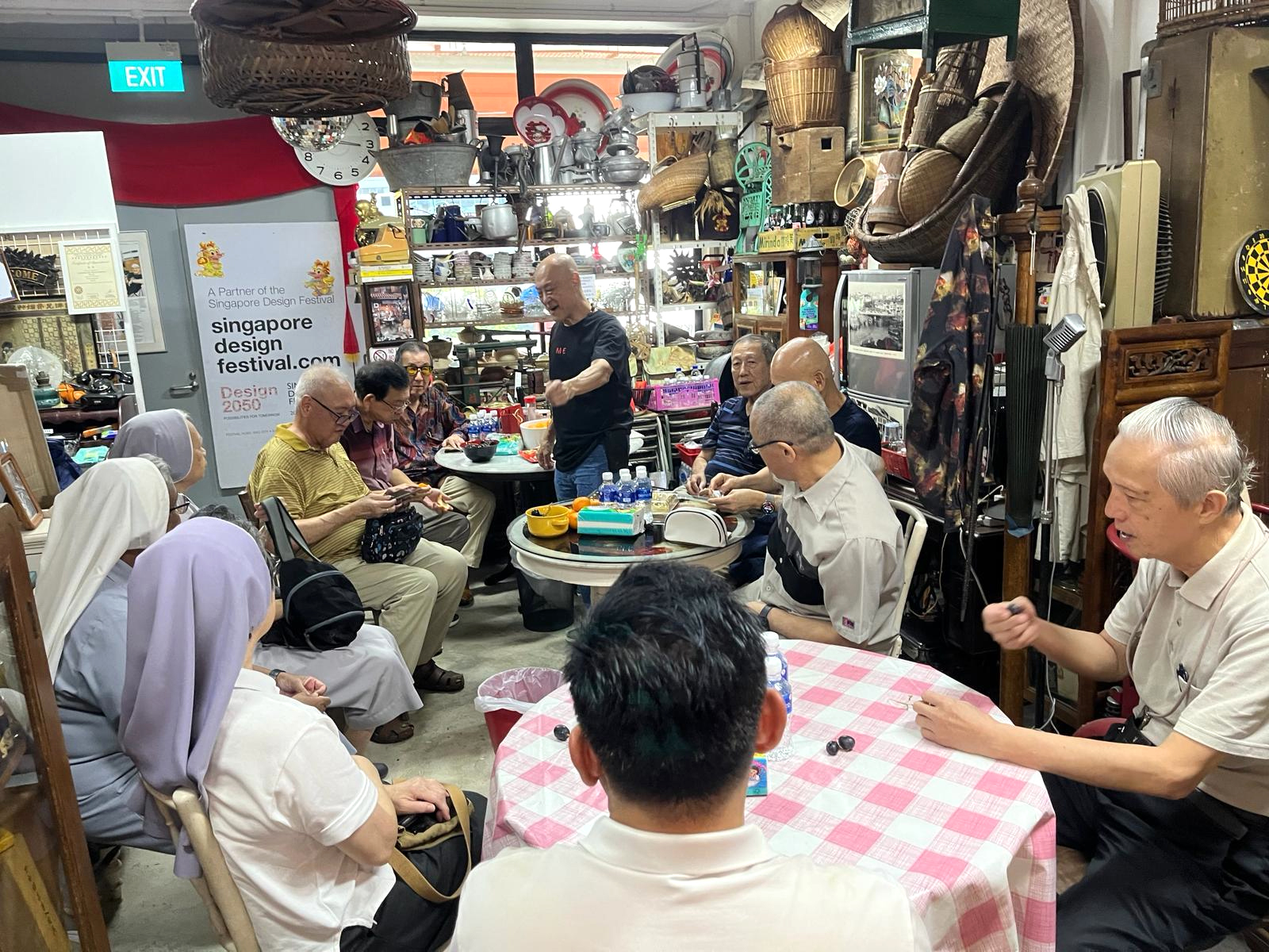Charlie interacting with visitors and discussing his creative process.