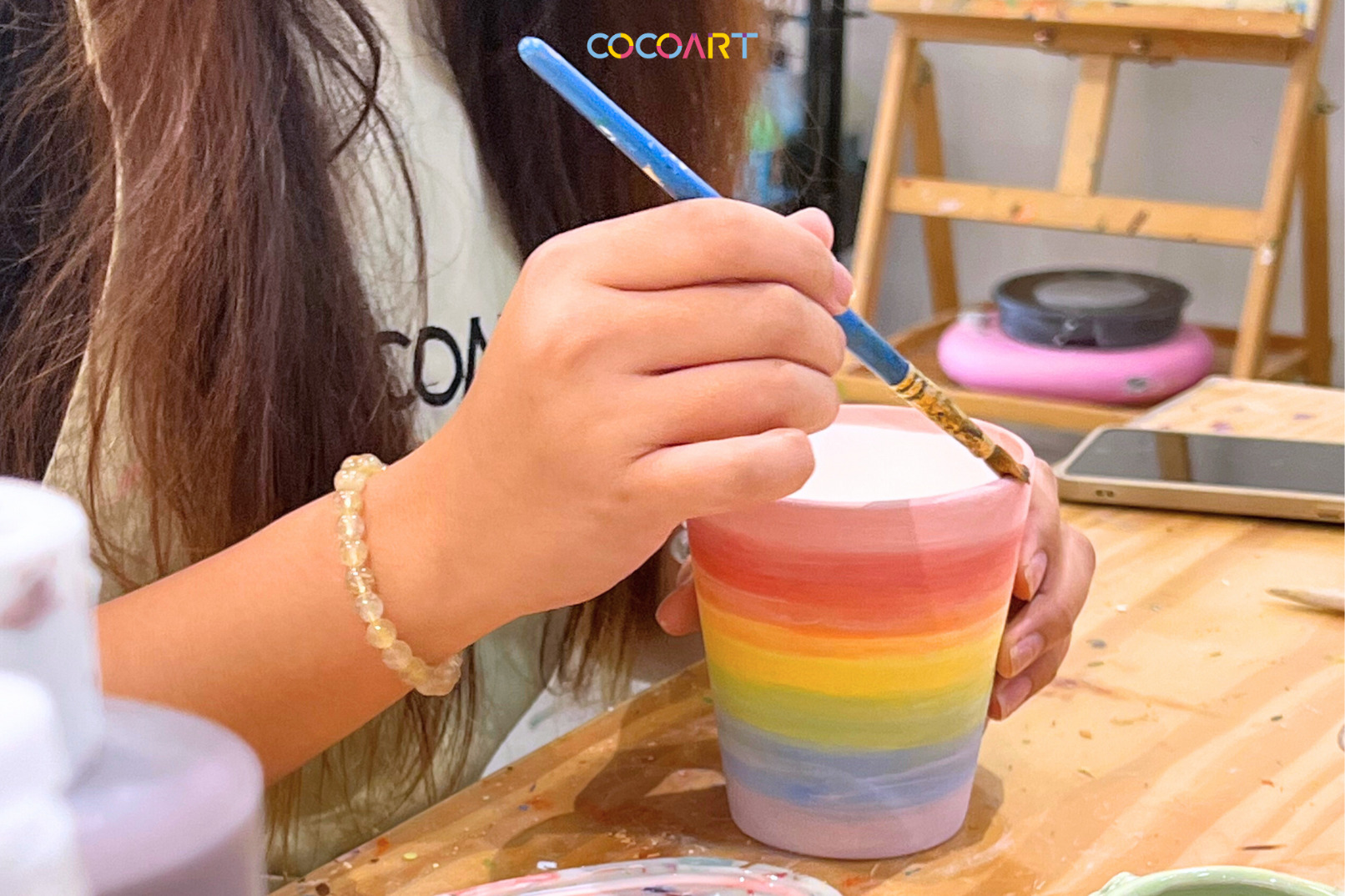 Immerse yourself in a cozy shophouse while expressing creativity through pottery painting. Design your own ceramic masterpiece making lasting memories in Singapore's artistic corner.