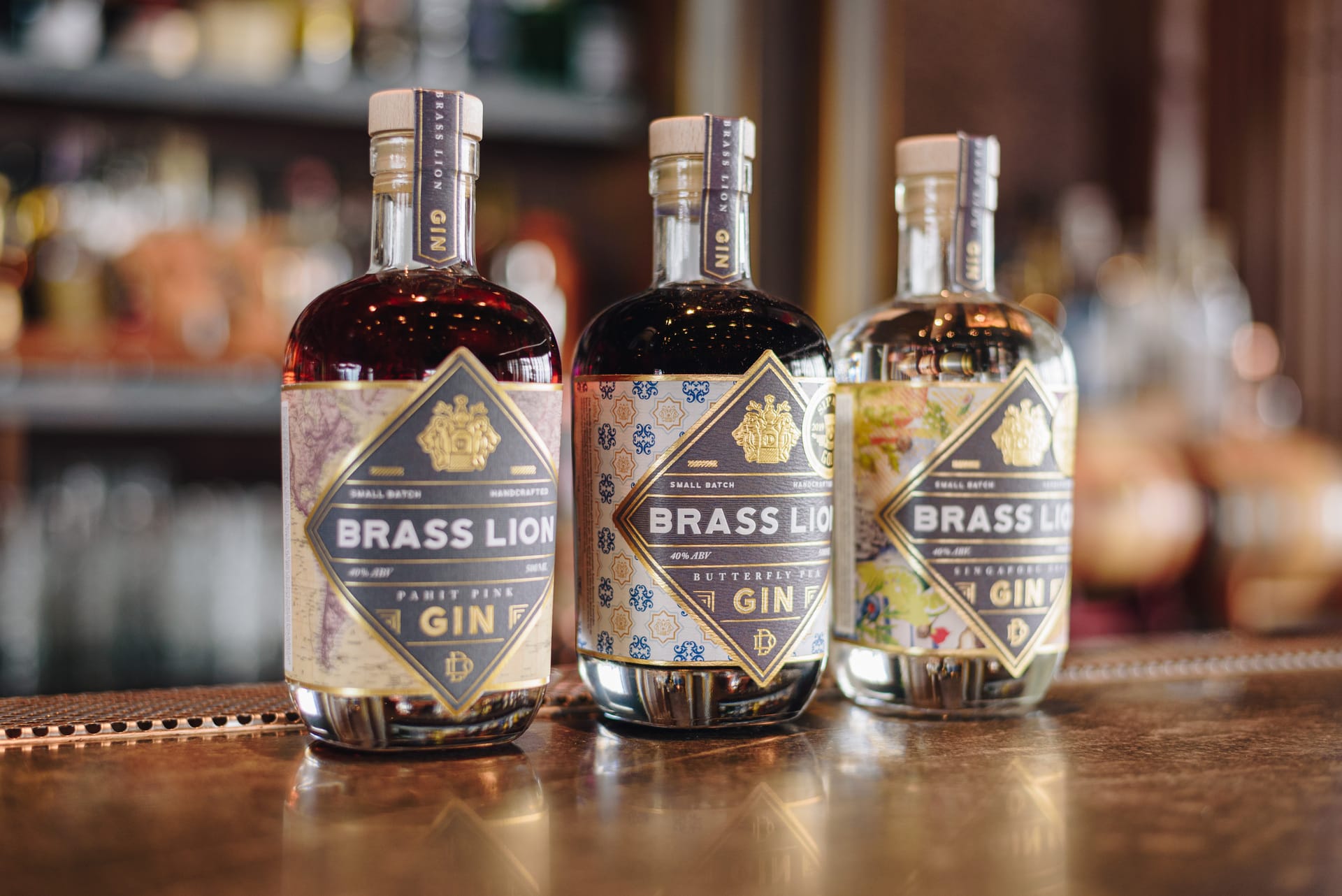 Experience the elegance of CÉ LA VI’s rooftop bar showcasing the Brass Lion Gin range where expert mixologists craft unique cocktails inspired by regional flavors in a stylish setting.