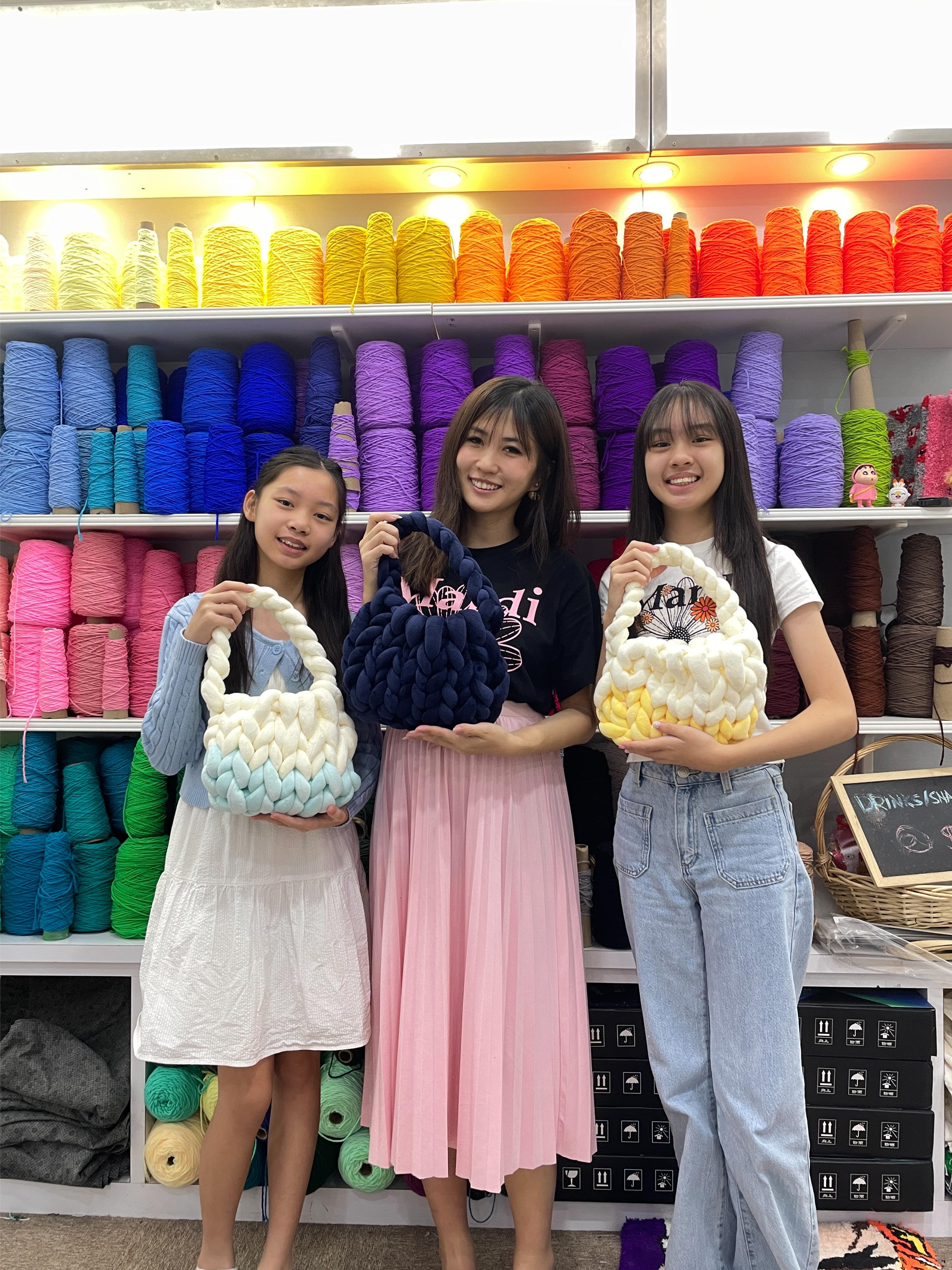 Immerse yourself in a creative space filled with colorful yarn as you craft your unique velvet bag alongside fellow enthusiasts blending artistry and fun in Singapore.