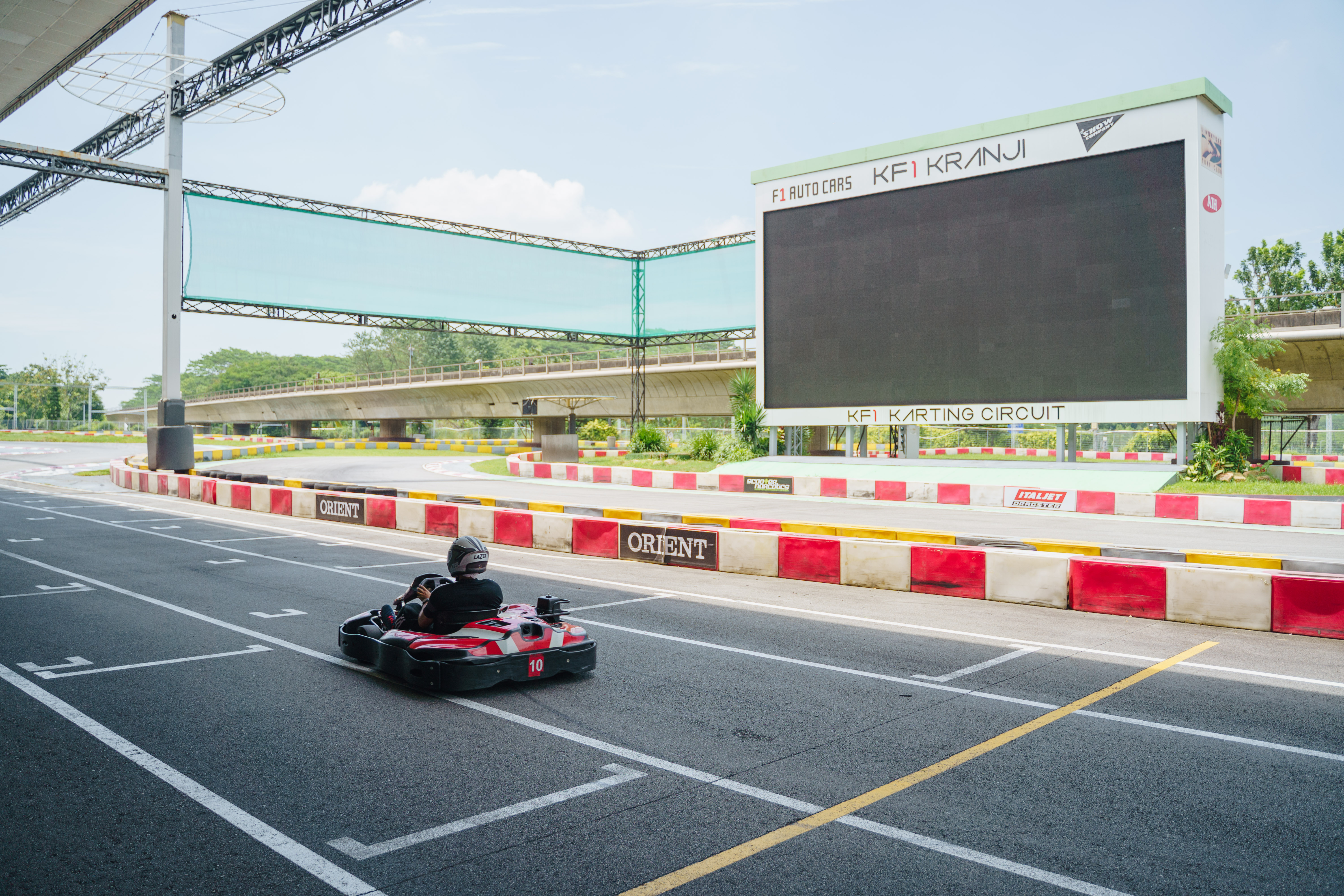 Feel the rush as you navigate the 960-meter KF1 Karting Circuit with its unique design offering both clockwise and counter-clockwise racing. An exhilarating experience awaits all ages!
