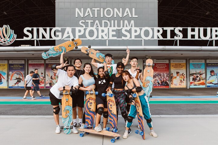 Join a community of passionate longboarders at Singapore Sports Hub where expert instructors guide beginners through essential techniques amidst stunning surroundings. Experience the joy of mastering longboarding together.