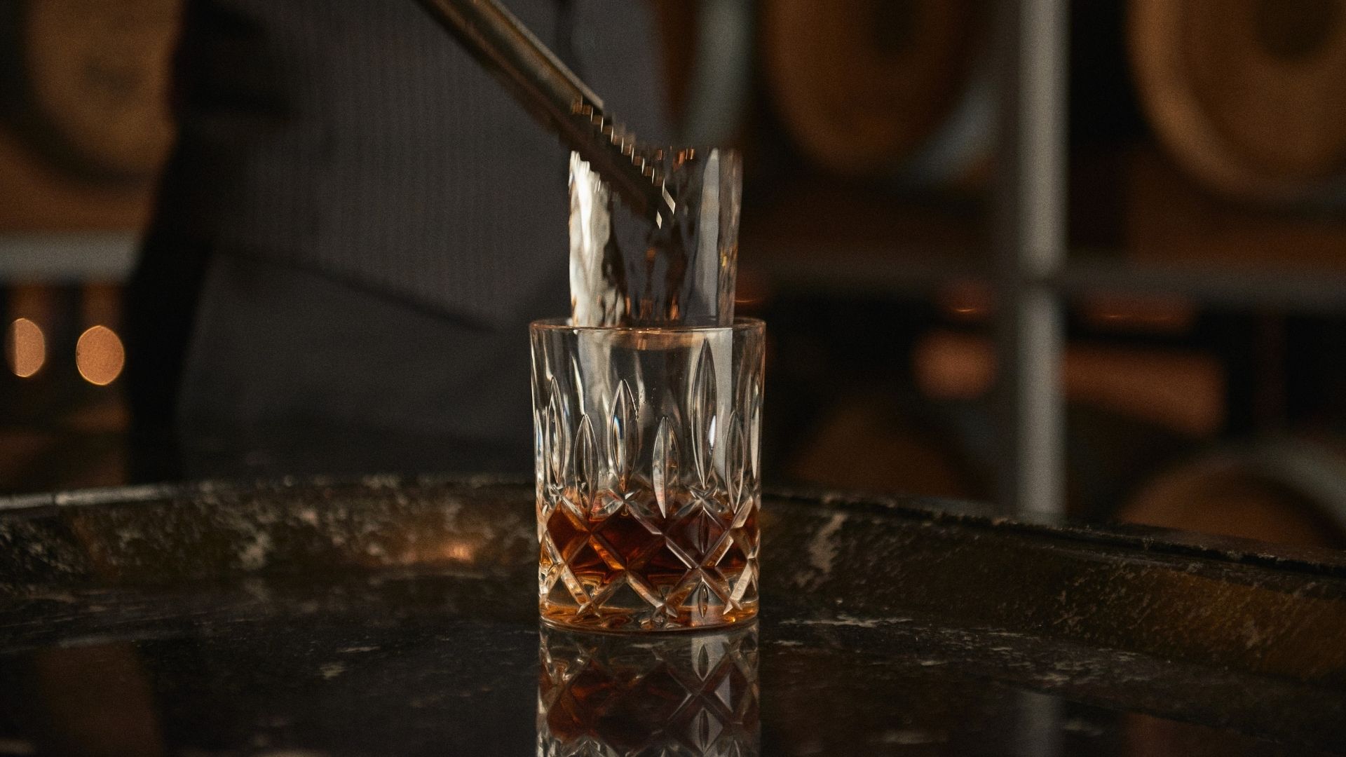 Experience the art of barrel-aged cocktails sampling unique flavors and savoring Maker's Mark Private Select whisky in an exclusive setting at Manhattan Conrad Singapore Orchard.