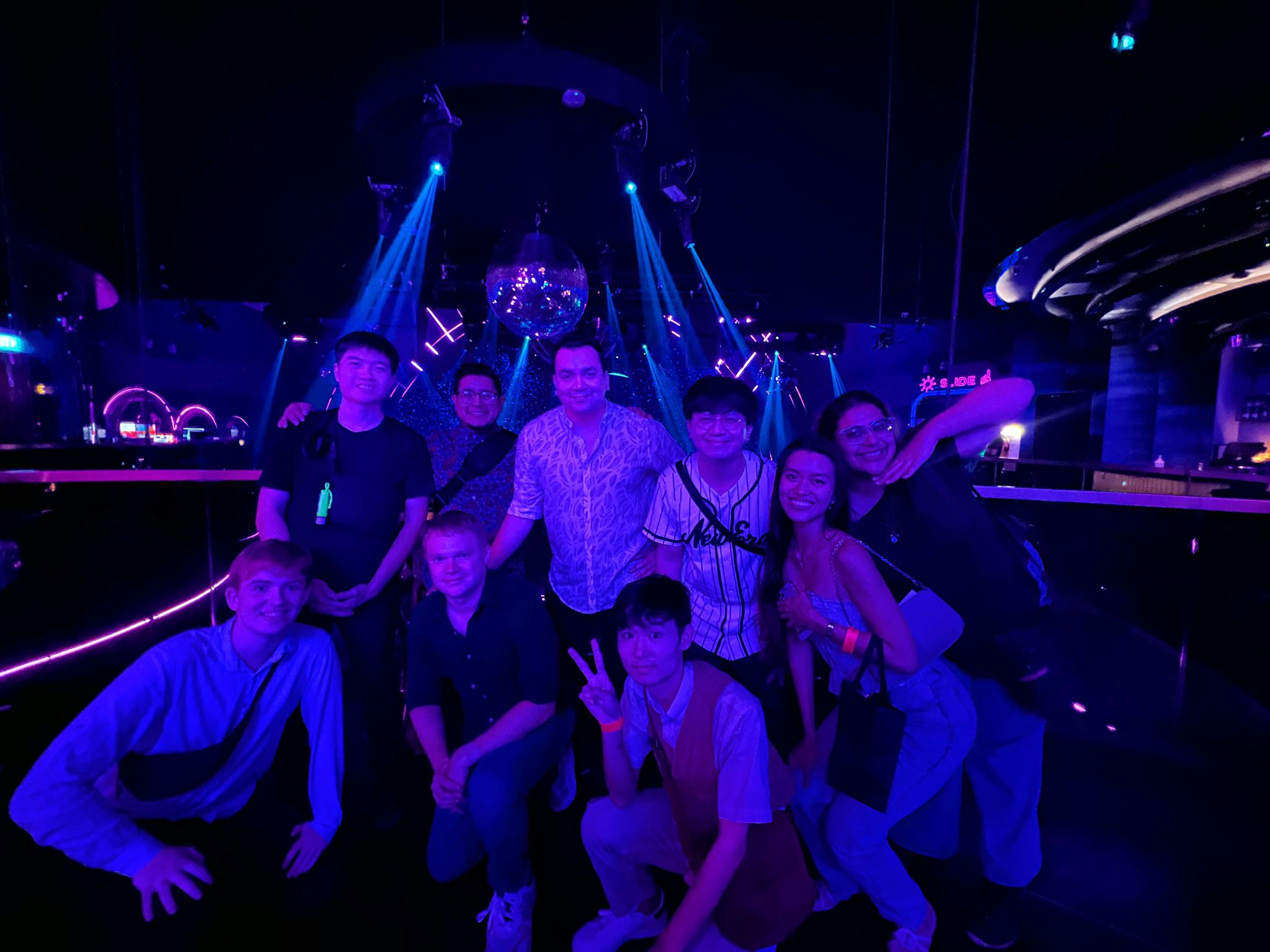 Dive into the nightlife with friends surrounded by dazzling lights and energetic vibes creating unforgettable memories as you explore Singapore's hottest bar and club scene.