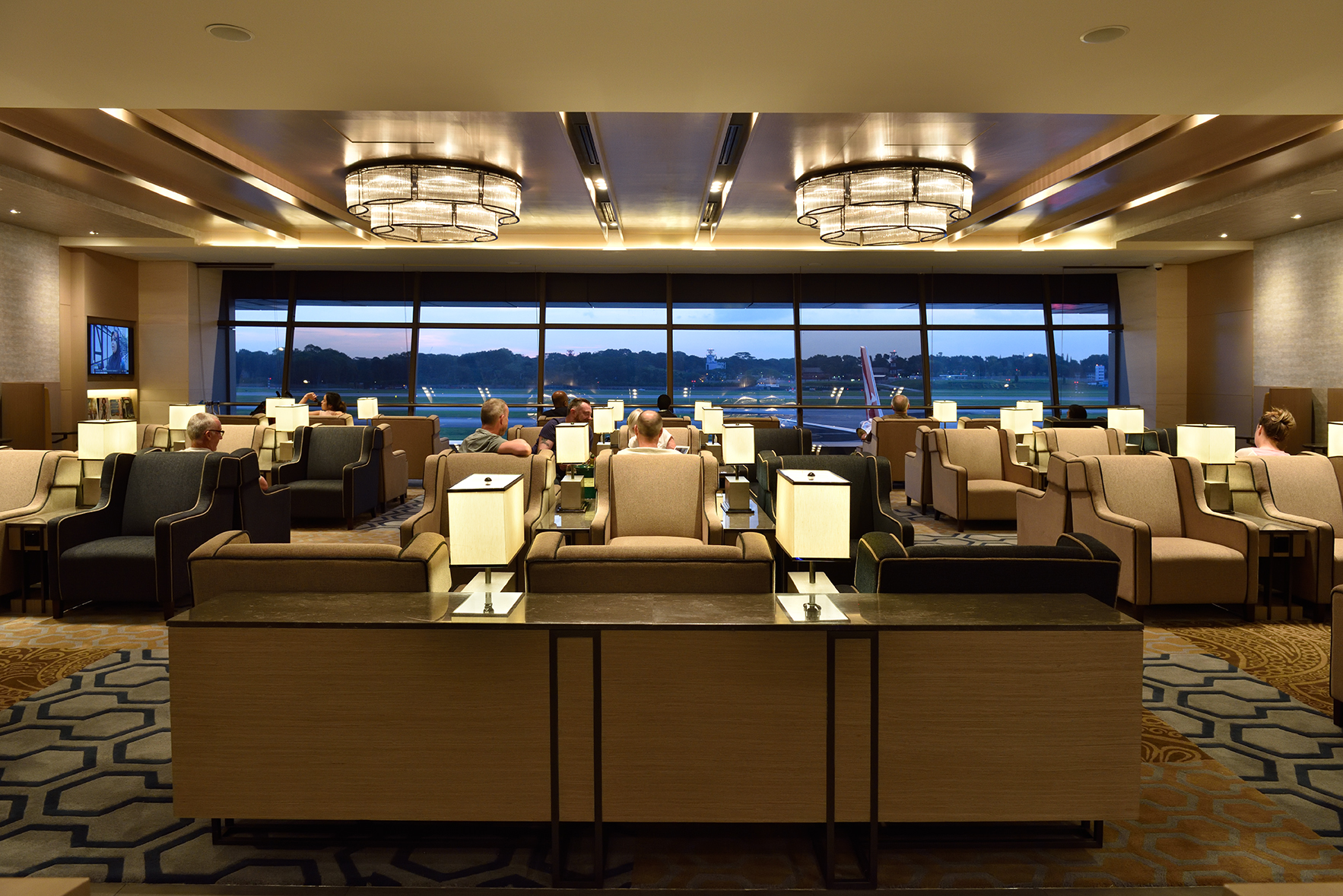 Relax in comfort at Plaza Premium Lounge Singapore where cozy seating stunning views and essential amenities create a perfect getaway between flights. Enjoy a rejuvenating experience tailored for travelers.