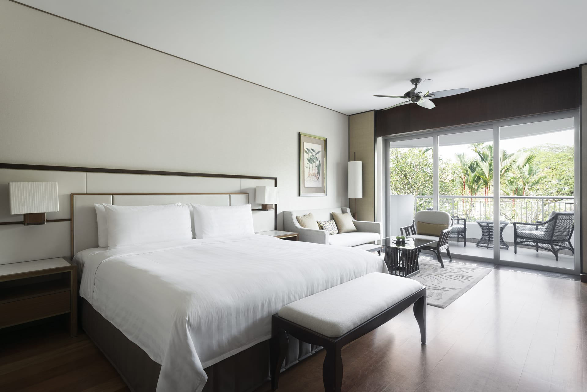 Experience ultimate relaxation in a chic retreat featuring a spacious room with serene views premium comforts and easy access to luxurious amenities at Shangri-La Hotel Singapore.
