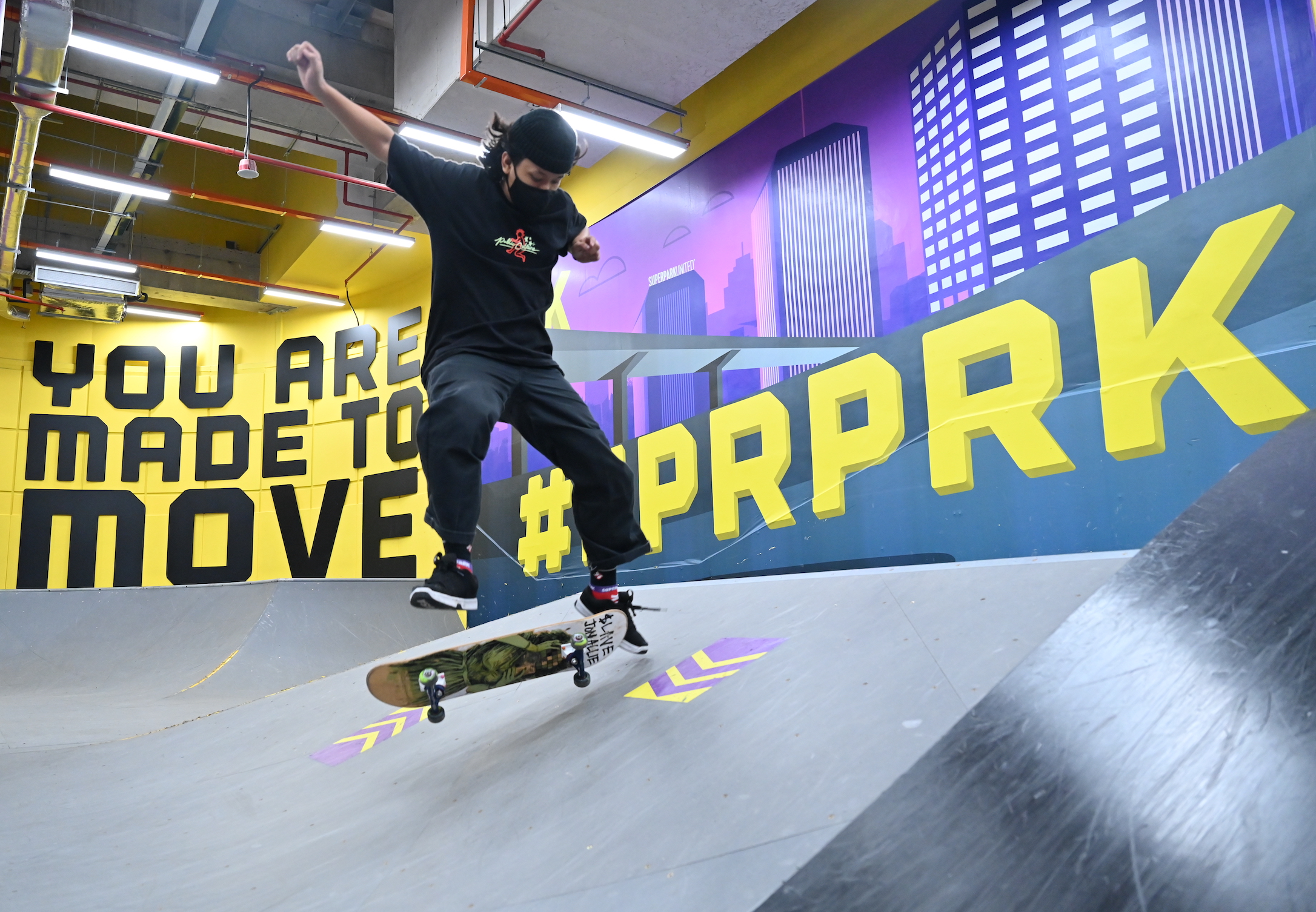 Experience the excitement of skateboarding at SuperPark Singapore where riders can showcase their skills in a dynamic indoor space designed for action and fun.