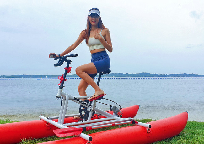 Pedal through serene waters at Pasir Ris beach on a waterbike enjoying the sun while staying dry. A unique way to have fun and stay active with friends and family.
