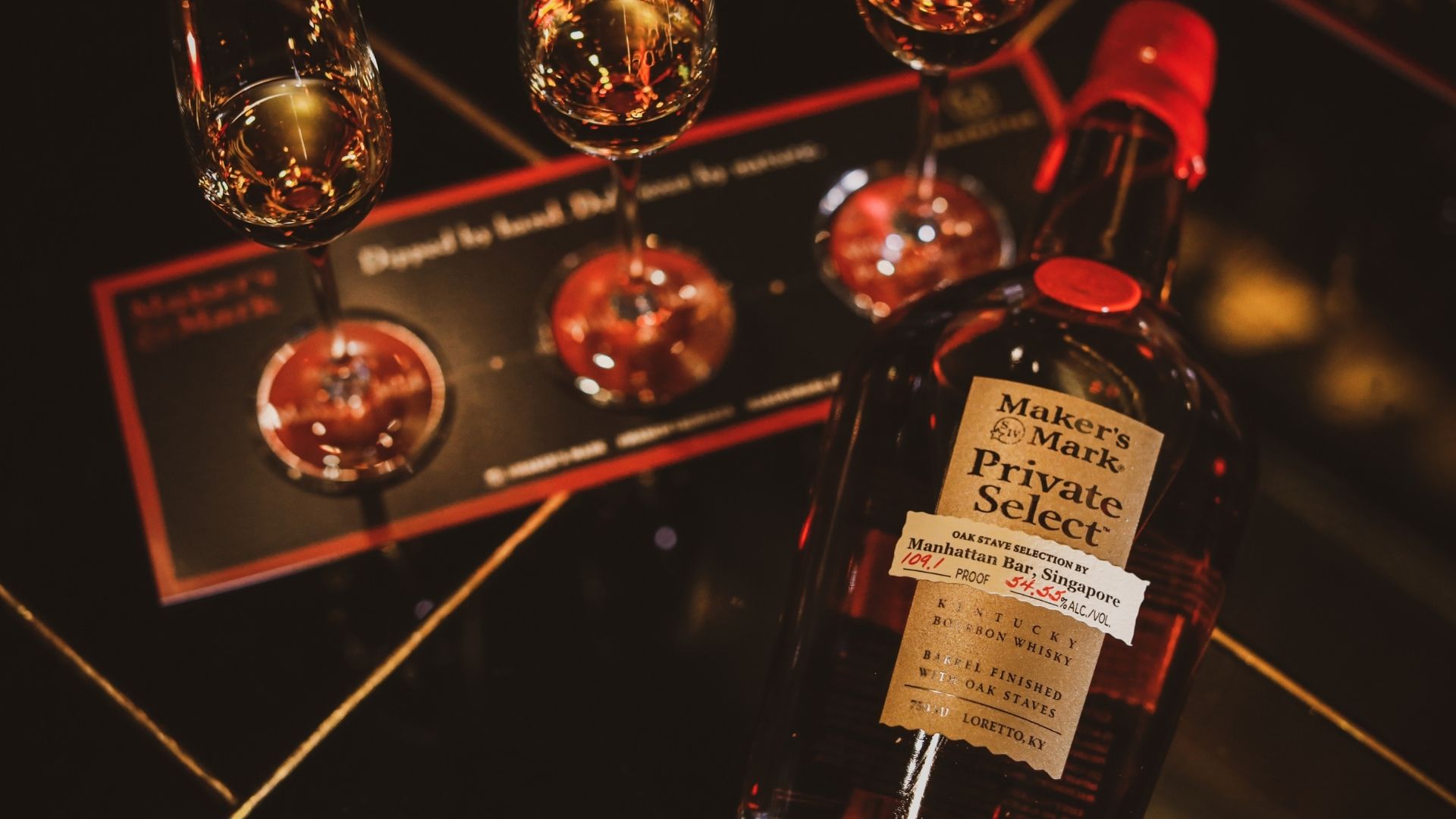 Experience a curated tasting of exceptional whiskies highlighting unique flavors from Maker's Mark and Hakushu all set in the sophisticated surroundings of Manhattan at Conrad Singapore Orchard.