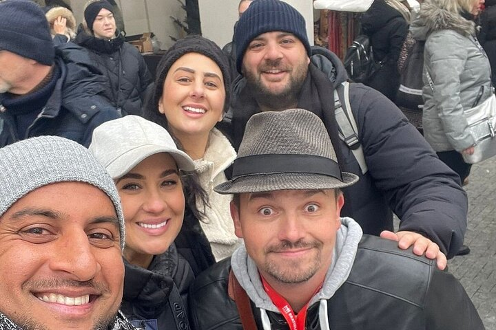 Smiling tour guide and smiling clients