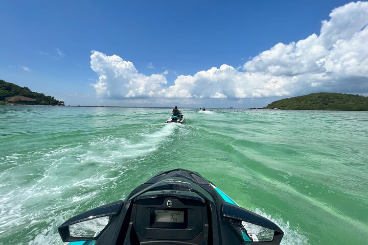 Experience the thrill of jet skiing through the stunning waters of Koh Samui exploring hidden islands and enjoying breathtaking views alongside friends and family all in comfort and style.