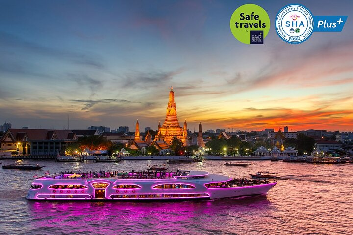 Indulge in a buffet of Thai Japanese and international dishes while cruising the Chao Phraya River soaking in breathtaking views of Bangkok’s iconic landmarks under a starlit sky.
