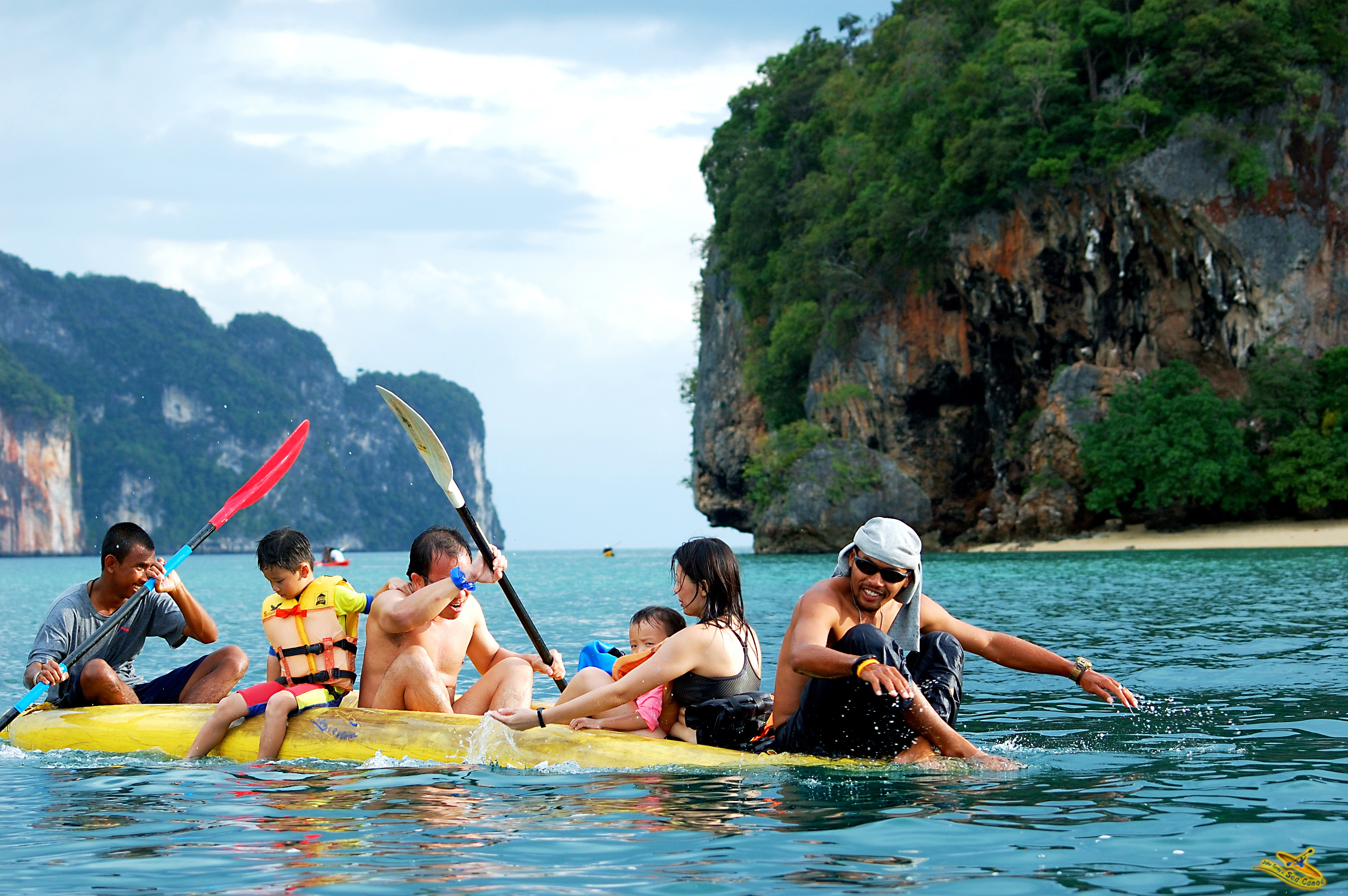 Paddle through stunning limestone karst formations while families enjoy the water creating unforgettable memories amidst Phang Nga’s picturesque landscapes and rich marine life.