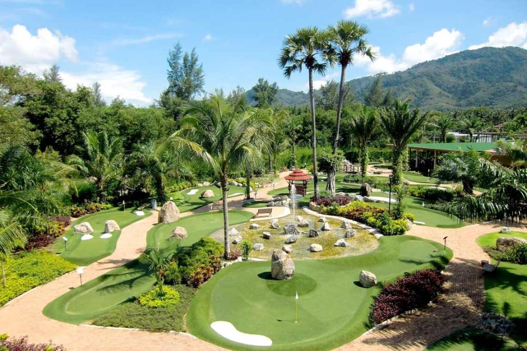 Experience a delightful day of mini golf surrounded by palm trees and serene water features perfect for friends family or a romantic outing in beautiful Phuket.