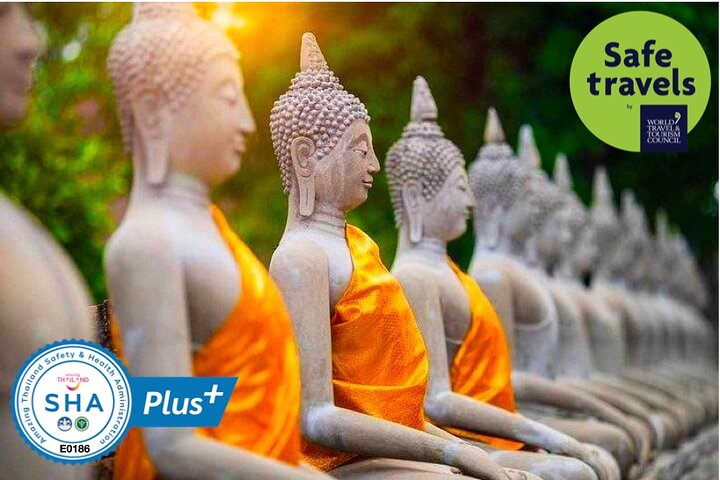 Experience the serene beauty of Ayutthaya’s ancient temples and the tranquil ambiance of a riverboat ride at sunset immersing yourself in the rich history and culture of Thailand.