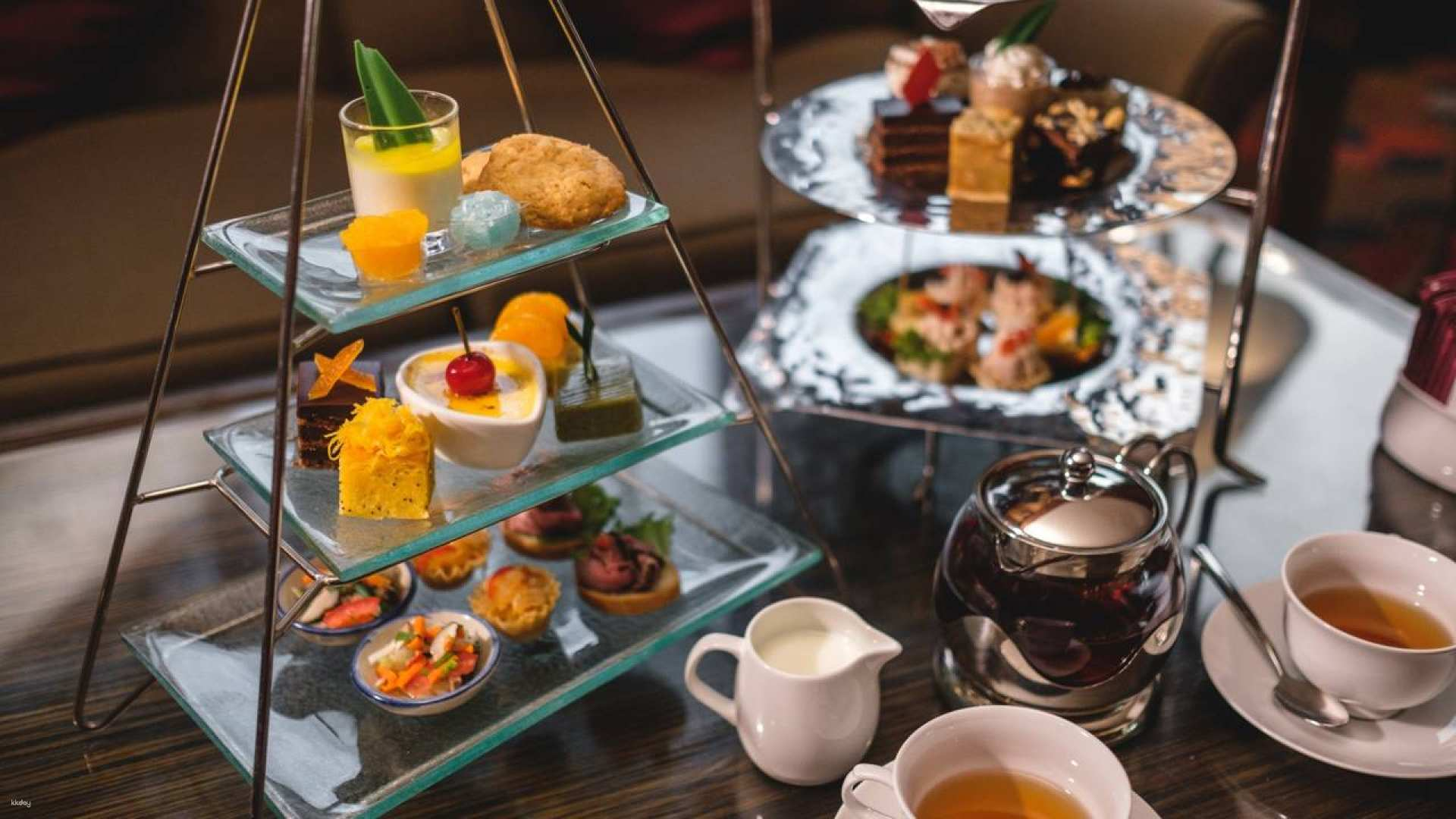 Indulge in a delightful afternoon tea experience featuring expertly crafted pastries and savory sandwiches all served amid the elegant charm of the Royal Orchid Sheraton's Lobby Lounge. Enjoy a taste of luxury.