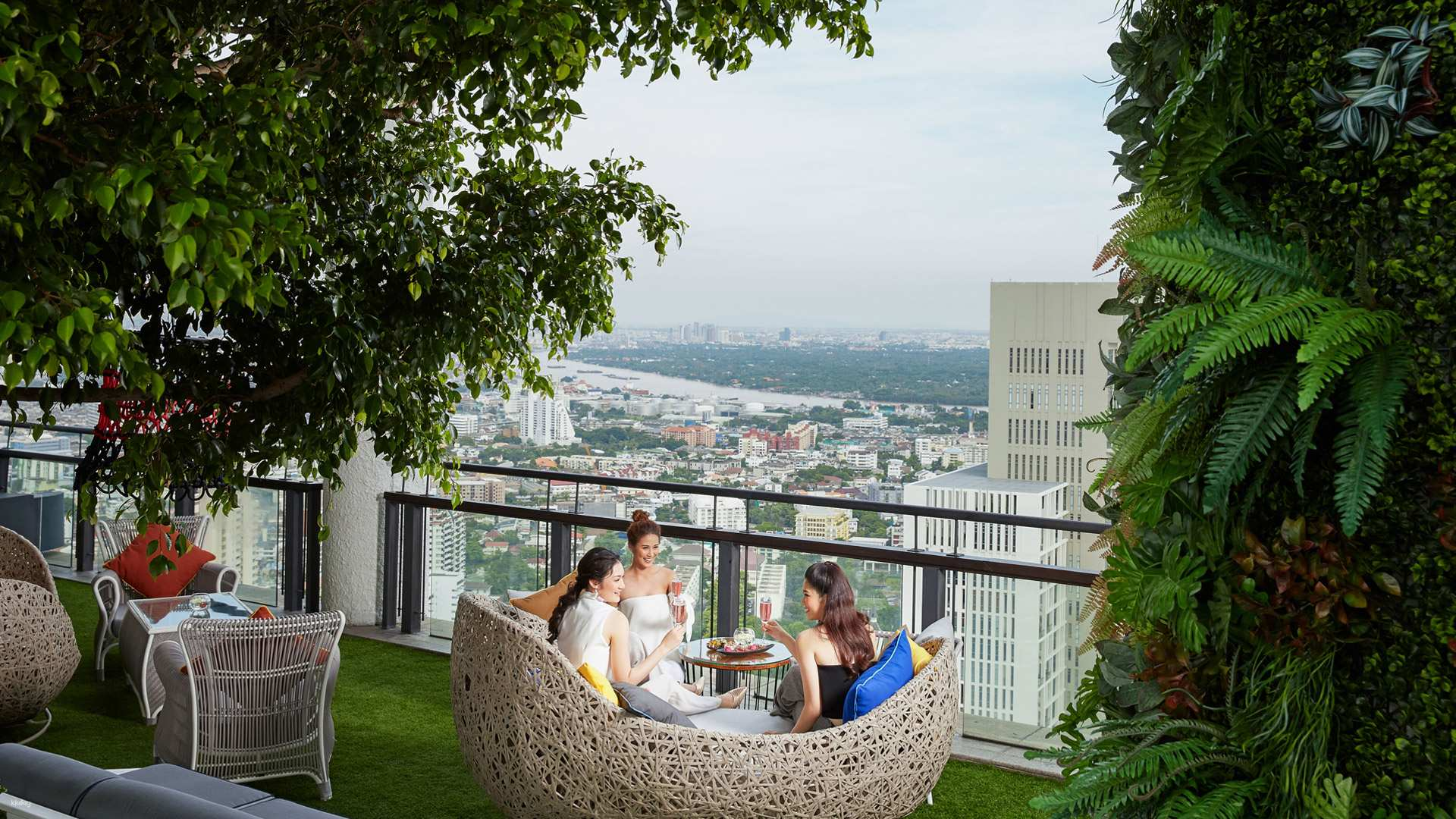 Elevate your experience with panoramic views of Bangkok while sipping free-flow drinks in a stylish open-air garden. Perfect for memorable gatherings and relaxed conversations.