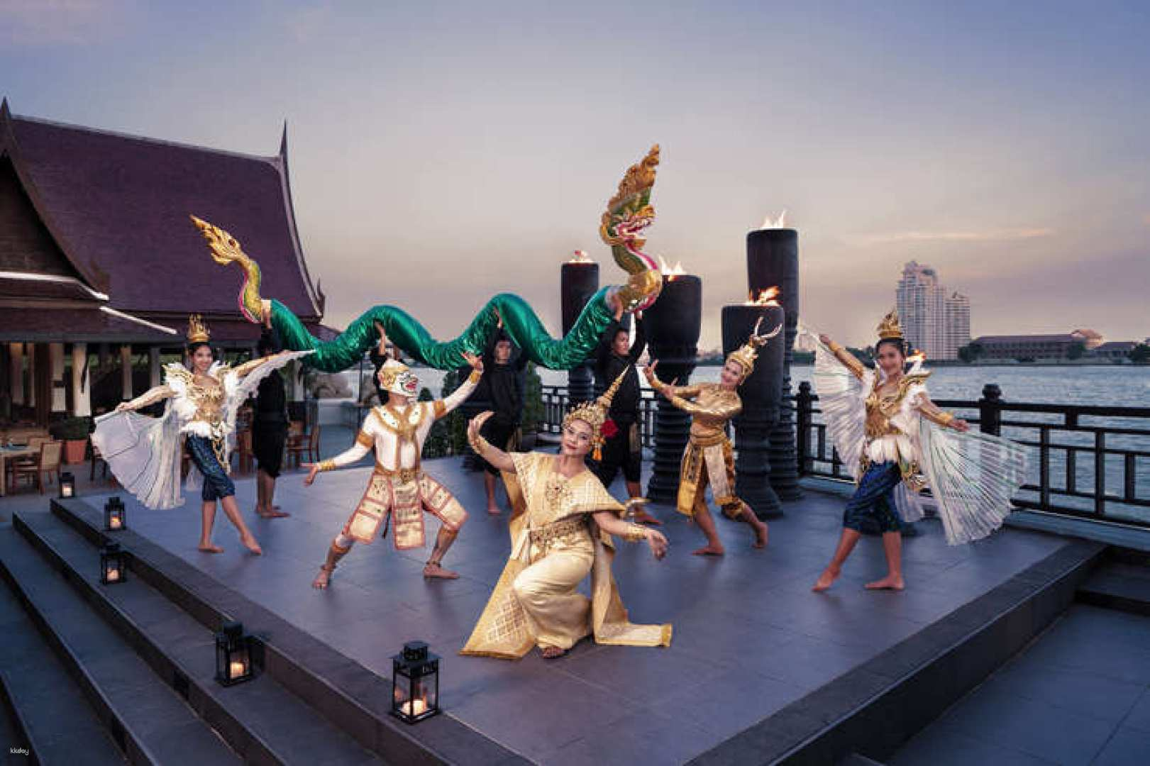 Experience a magical dinner with traditional Thai performances at Anantara Riverside Terrace overlooking the serene Chao Phraya River where culinary delights meet cultural richness.