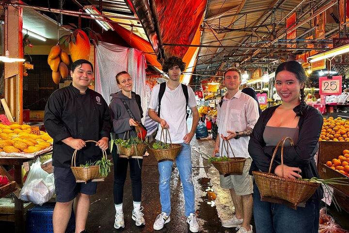Experience the lively energy of Bangkok's markets where travelers engage with local flavors and fresh ingredients guided by expert chefs passionate about sharing authentic Thai culinary traditions.