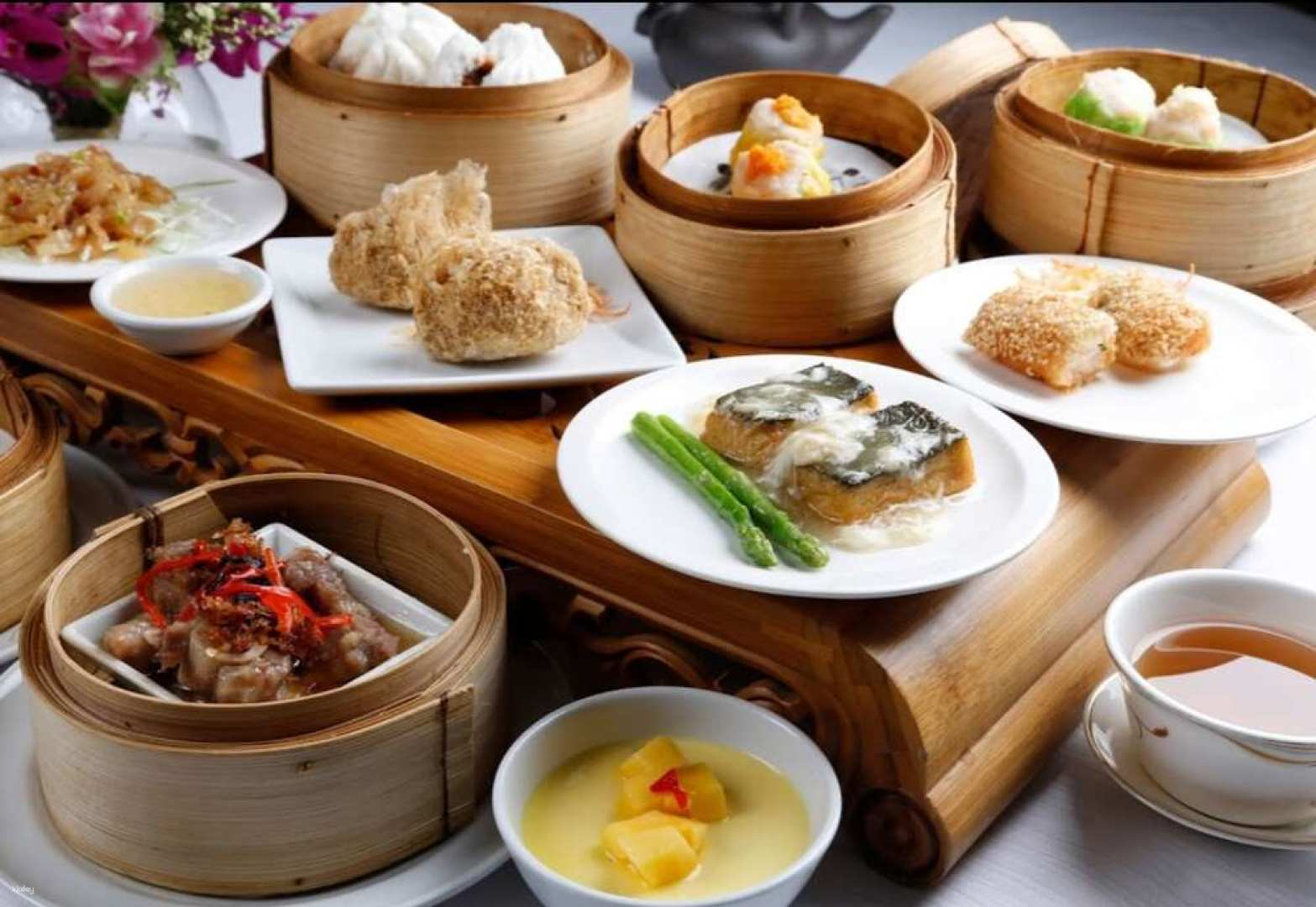 Indulge in exquisite dim sum during a delightful lunch buffet at Shangri-La Hotel set against Bangkok's breathtaking riverside. A perfect escape into culinary bliss awaits.