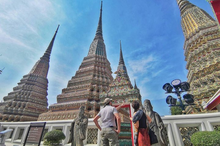 Discover the intricate architecture of Bangkok's temples as you explore stunning landmarks. Engage with local culture while sampling unique snacks at historic markets creating unforgettable memories.