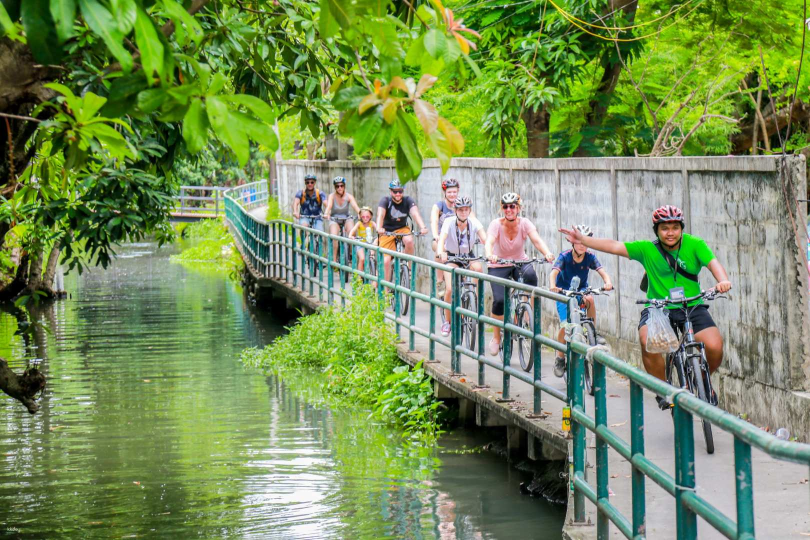 Pedal through Bangkok's lush backwaters discovering hidden paths local culture and a delightful canal-side lunch all while soaking in the serene charm of the city’s waterways.